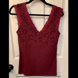 Dark red sleeveless, low back top